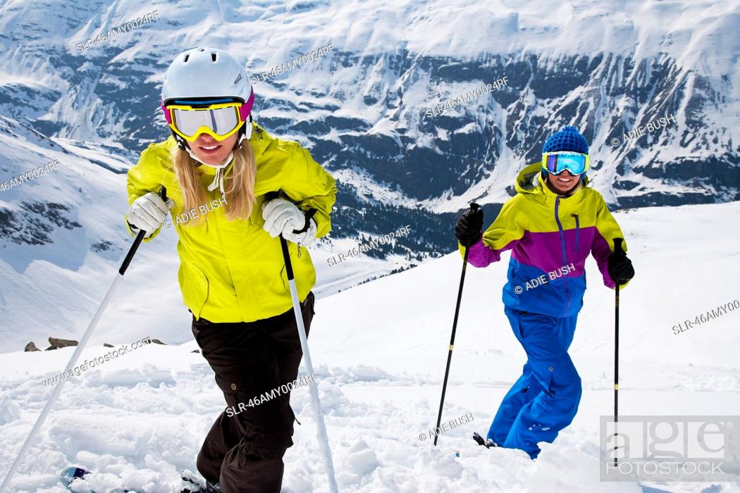 Stock Photo: Skiers standing on snowy slope.