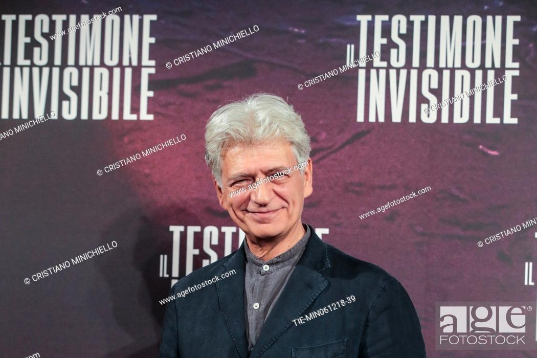Stock Photo: The actor Fabrizio Bentivoglio during the photocall of film Il testimone invisibile, Rome, ITALY-06-12-2018.