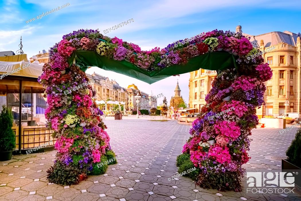 Stock Photo: Flower arch on the Victory Square (Piata Libertatii) in Timisoara, Romania.