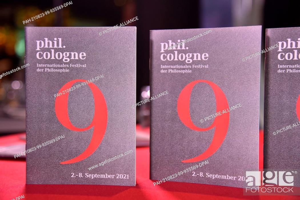 Stock Photo: 18 August 2021, North Rhine-Westphalia, Cologne: Program of the 9th phil Cologne, the InternationalFestival of Philosophy in Cologne.