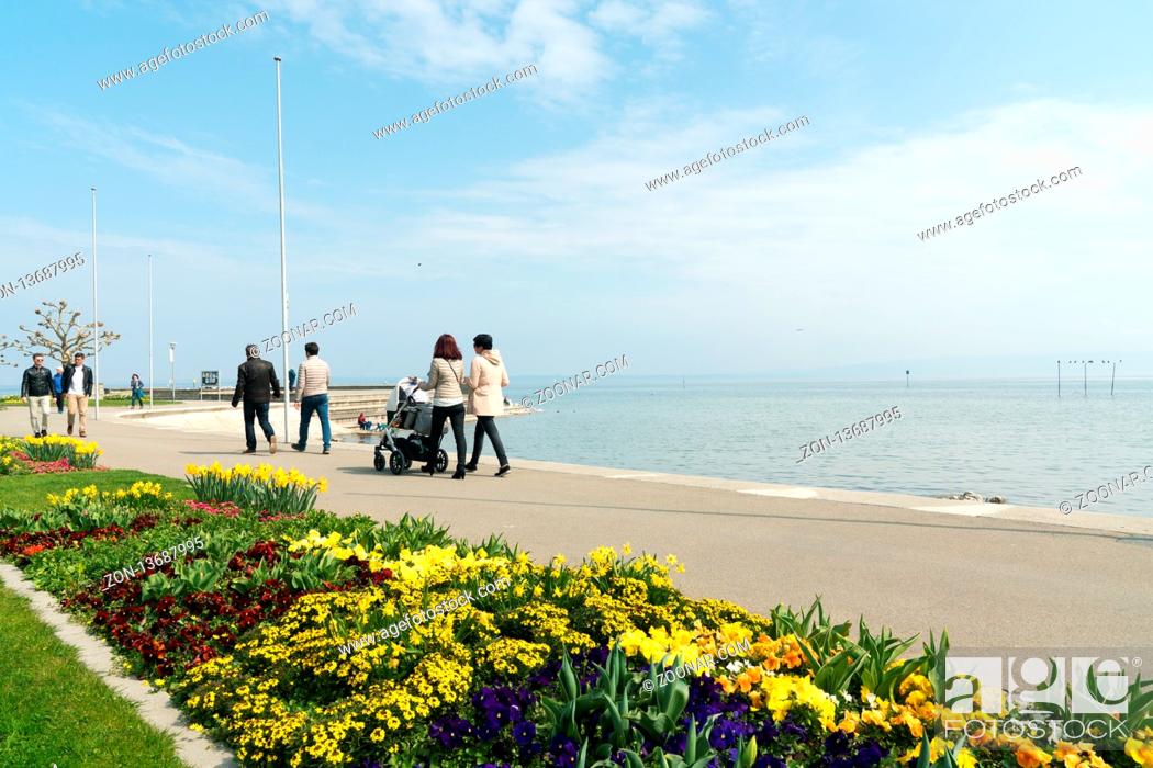 Stock Photo: Aarbon, SG / Switzerland - April 7, 2019: tourist and locals enjoy a beautiful spring day on the shores of Lake Constance in Switzerland.