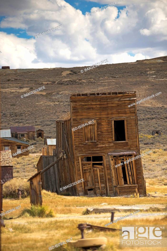 Stock Photo: Leaning abandoned old store in Bodie ghost town, Bodie National Park, California, USA.