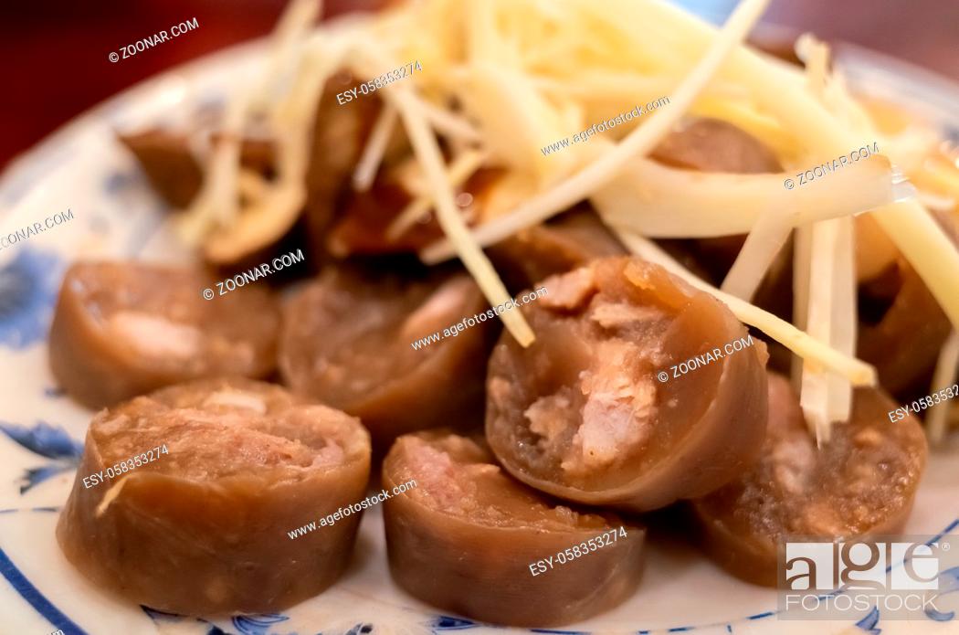 Stock Photo: taiwanese special snack of sticky rice sausage on a plate.