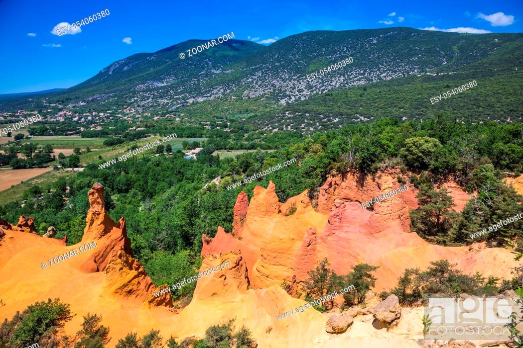 Stock Photo: The pit on production ochre. Languedoc - Roussillon, Provence, France. Orange picturesque hills.