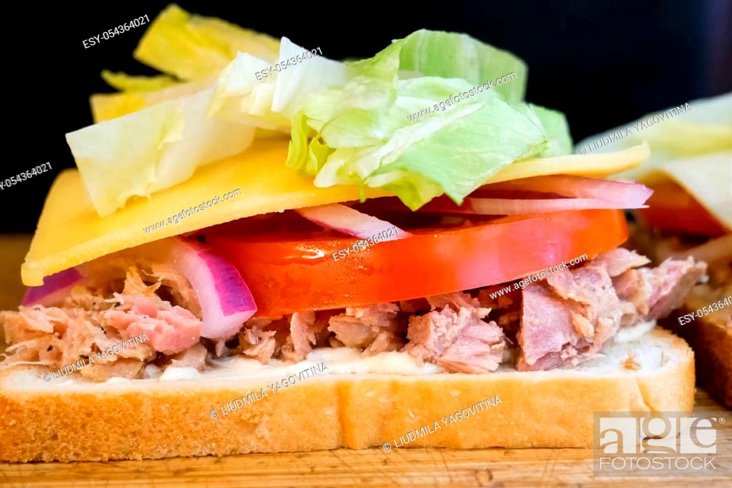 Stock Photo: Delicious appetizing sandwich, fast a fast food.