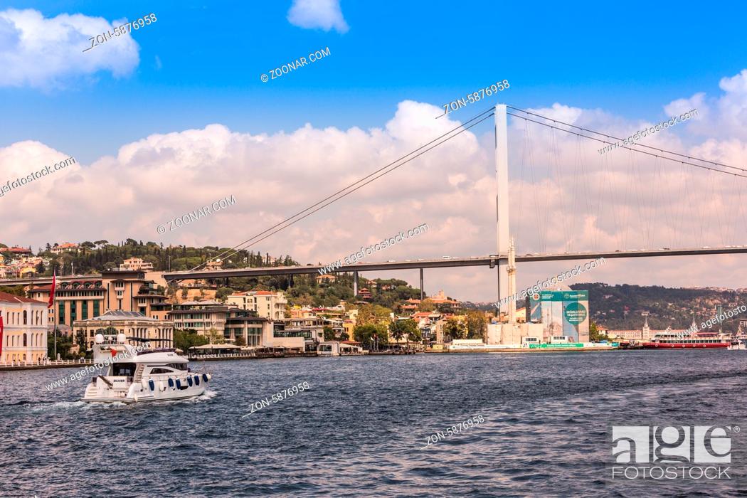 Stock Photo: ISTANBUL - AUGUST 8: transport on and under Ataturk Bridge (Bosphorus Bridge), August 8, 2013 in Istanbul, Turkey. Ataturk Bridge is a first suspension bridge.
