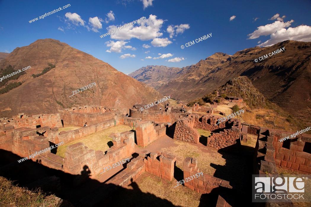 Stock Photo: Tourists near the Inca terraces of the ancient Inca settlement, Pisac Ruins , Cusco Region, Peru, South America.
