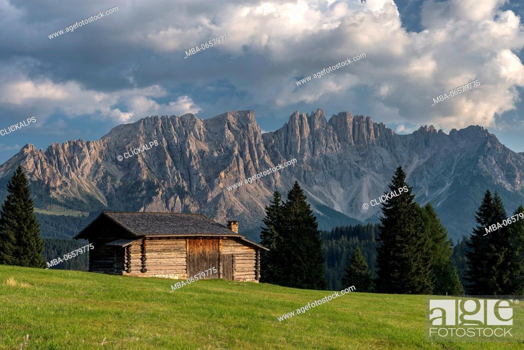 Stock Photo: Carezza, Dolomites, South Tyrol, Italy, Mountain Hut in the pastures of Colbleggio, In the background the peaks of the Latemar.