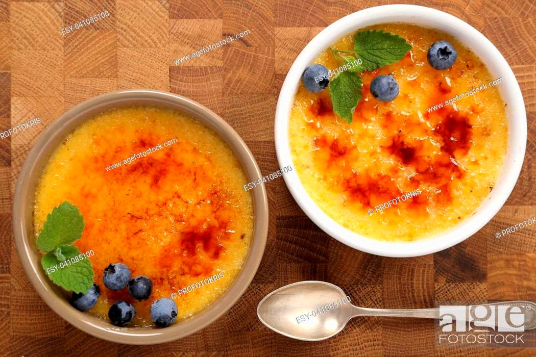 Stock Photo: Creme brulee - traditional french vanilla cream dessert with caramelised sugar on top.