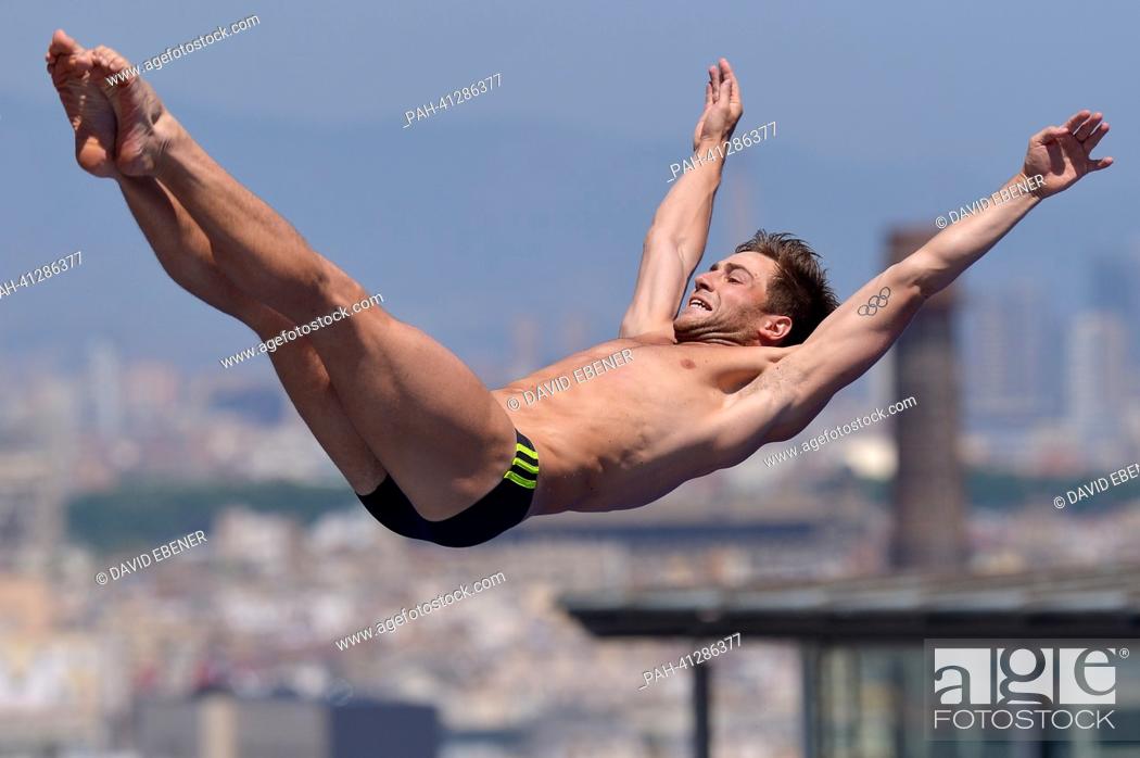 Stock Photo: Constantin Blaha of Austria in action during the men's 3m Springboard diving semifinal of the 15th FINA Swimming World Championships at Montjuic Municipal Pool.