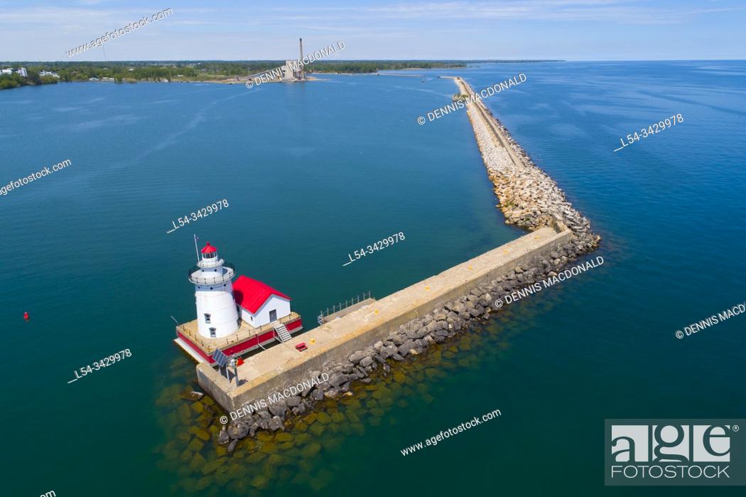 Stock Photo: lighthouse and harbor located at Harbor Beach MICHIGAN.