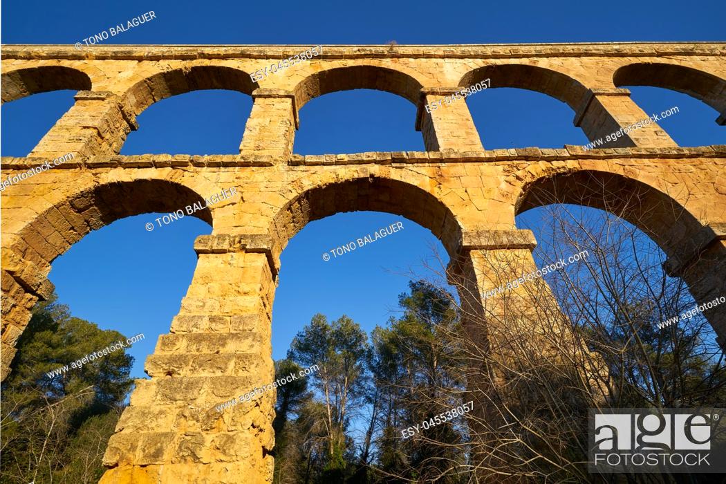 Stock Photo: Aqueduct Les Ferreres o Pont del Diable in Tarragona of Catalonia Roman.