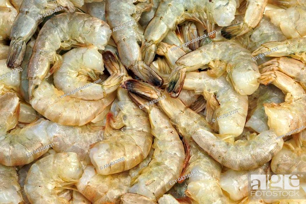 Stock Photo: Pile of Green Raw King Size Shrimps (Penaeidae Shrimps)Or Prawns Isolated On White Background.