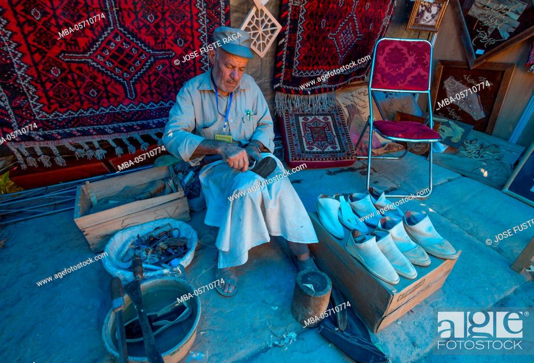 Stock Photo: Iran, Shiraz City, Arg-e Karim Khan Citadel, inside the citadel, shoe maker.