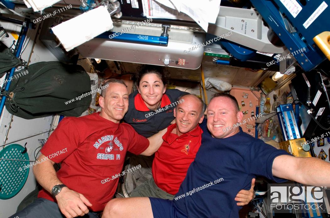 Stock Photo: Astronauts Charles O. Hobaugh (left), STS-129 commander; Nicole Stott, mission specialist; Jeffrey Williams, Expedition 21 flight engineer; and Barry E.
