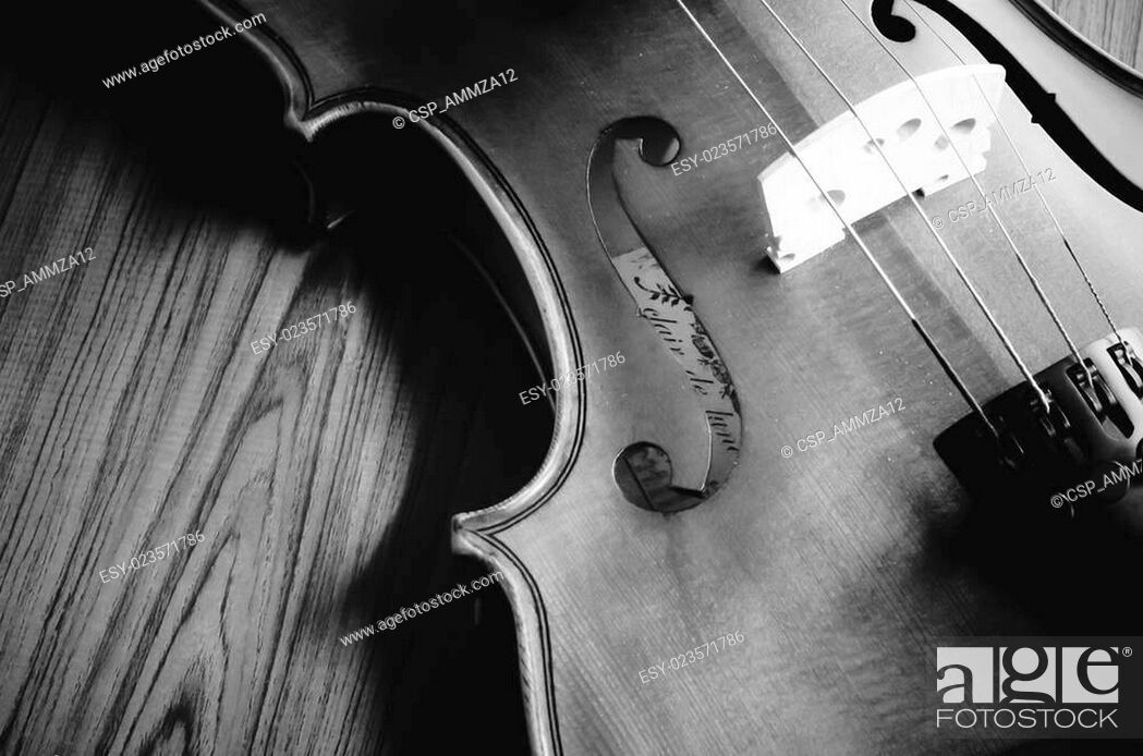 time to practice violin black and white color tone style, Stock Photo,  Picture And Low Budget Royalty Free Image. Pic. ESY-023571786 | agefotostock