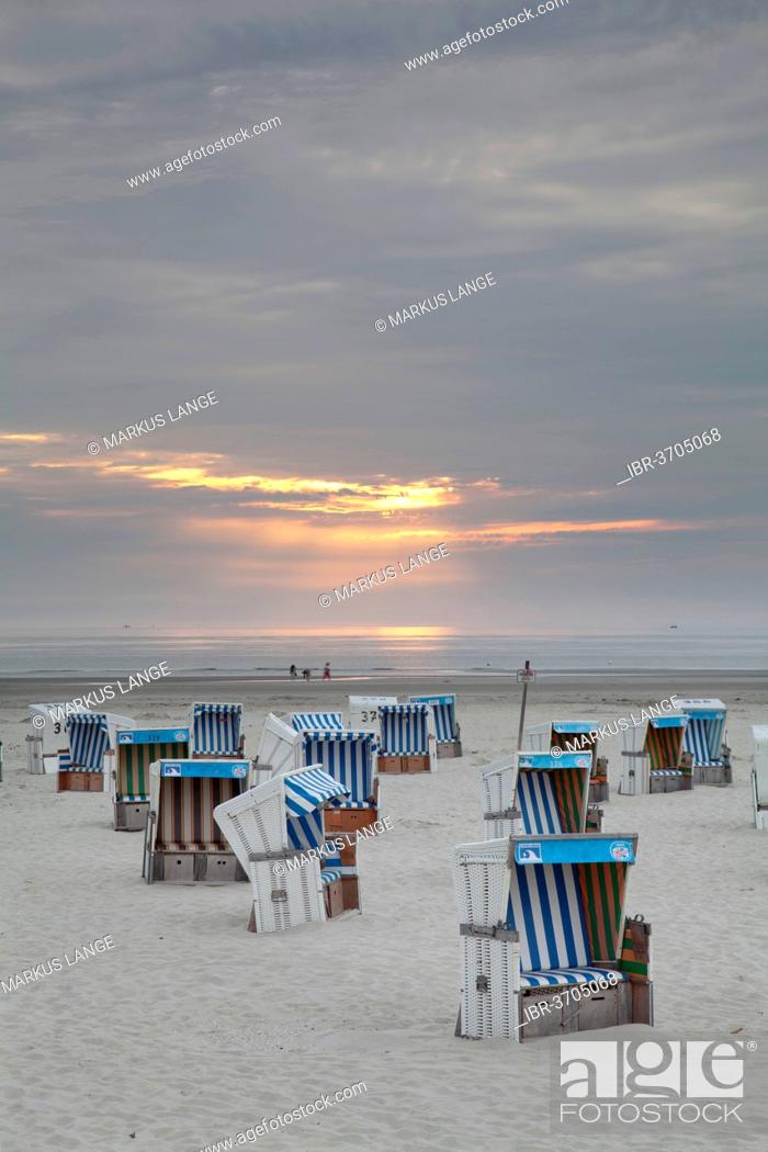 Stock Photo: Roofed wicker beach chairs on the beach, St. Peter-Ording, Eiderstedt, North Frisia, Schleswig-Holstein, Germany.