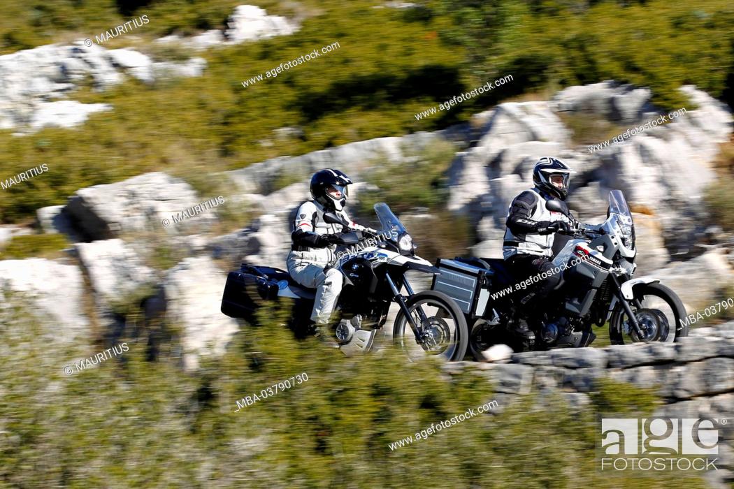 Stock Photo: 2 motorcycles, single cylinder Enduros, Yamaha Tenere and BMW G 650 GS, moving, Southern France, Mediterranean Sea, year of construction in 2012,.