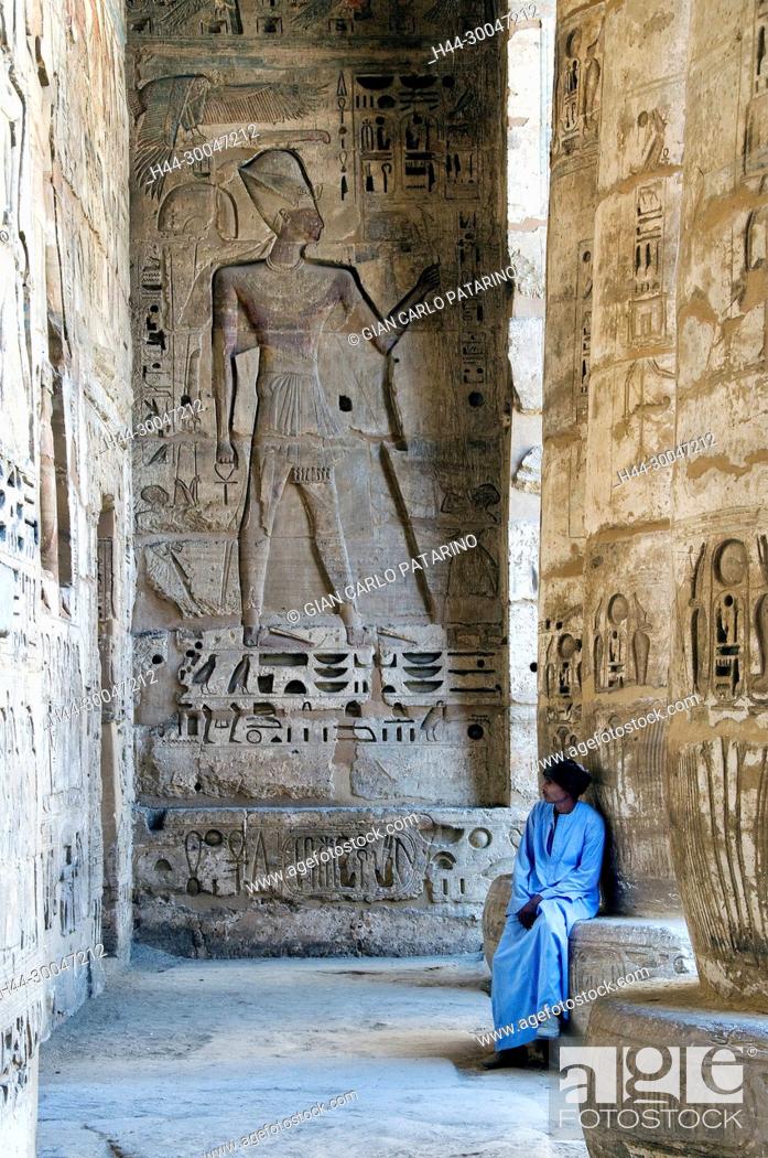Stock Photo: Medinet Habu, Luxor, Egypt, Djamet, mortuary temple of King Ramses III, XX dyn. 1185 -1078 B.C., : the king in the first courtyard of the temple.