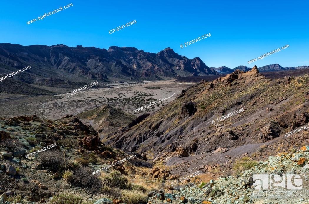 Stock Photo: Black and red valley of lava on Tenerife in Spain.