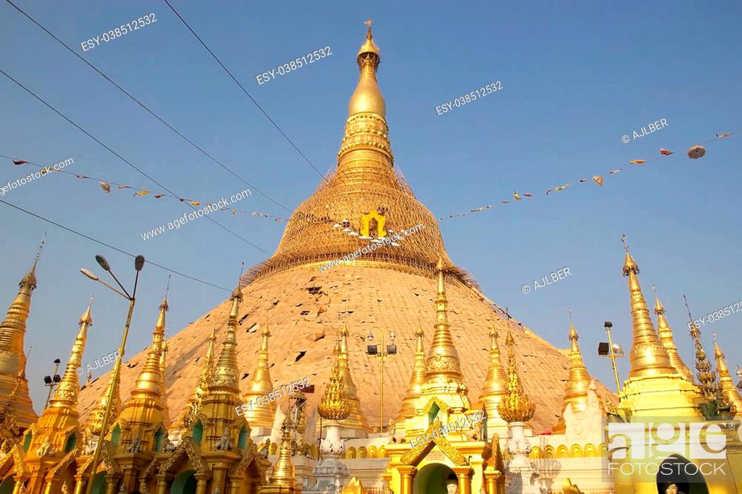 Stock Photo: Shwedagon Pagoda is a gilded stupa located in Yangon, Myanmar. The 99 metres tall pagoda is situated on Singuttare Hill, to the West of Kandawgyi Lake and.