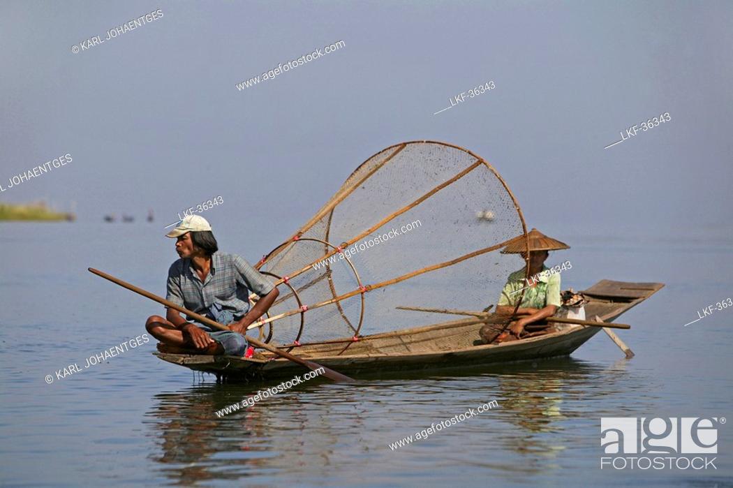 Stock Photo: Fisherman with wife, Inle Lake, Myanmar.