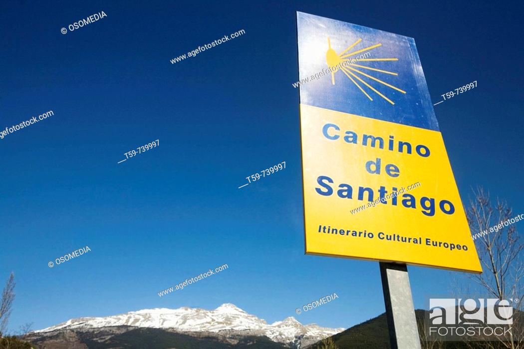 Stock Photo: St. James Way sign, Castiello de Jaca and Pyrenees Mountains in background. Huesca province, Aragon, Spain.
