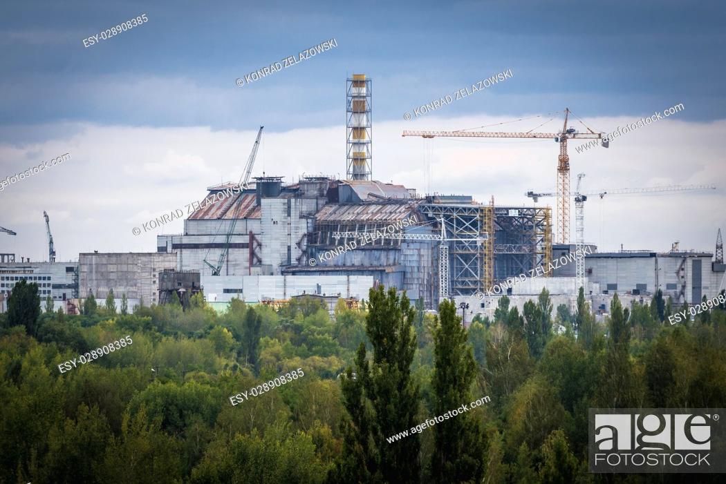 Stock Photo: Reactor number 4 of Chernobyl Nuclear Power Plant in Zone of Alienation around nuclear reactor disaster in Ukraine.