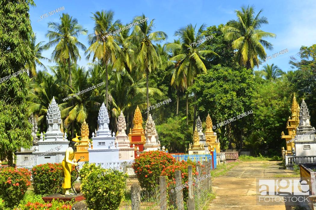 Stock Photo: Khmer cemetery in Wat Maha Leap buddhist temple , tombs representative of ancient Buddhist temples, Kampong Cham province, Cambodia, South East Asia, Asia.