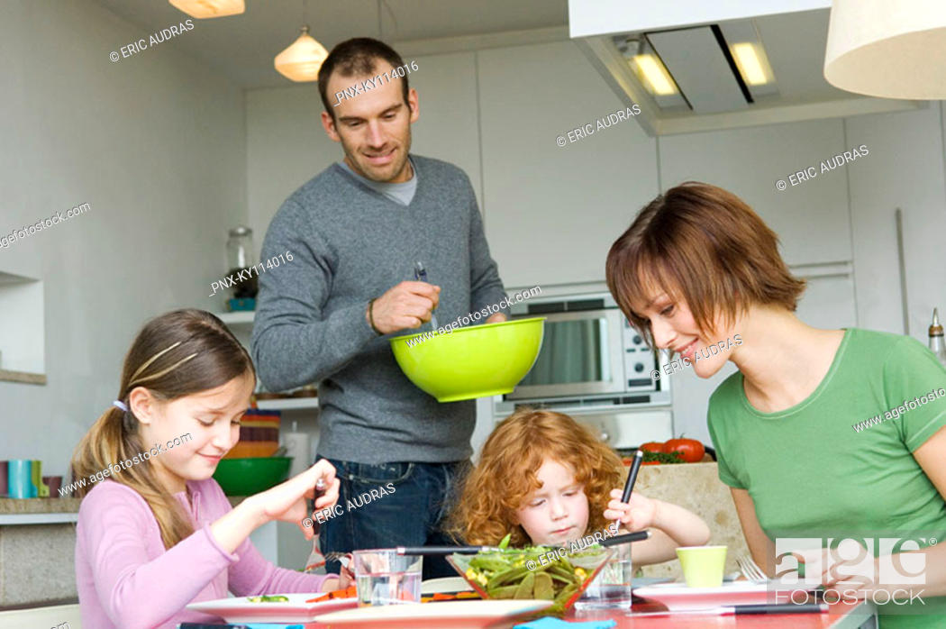 Stock Photo: Family at home, dinner.