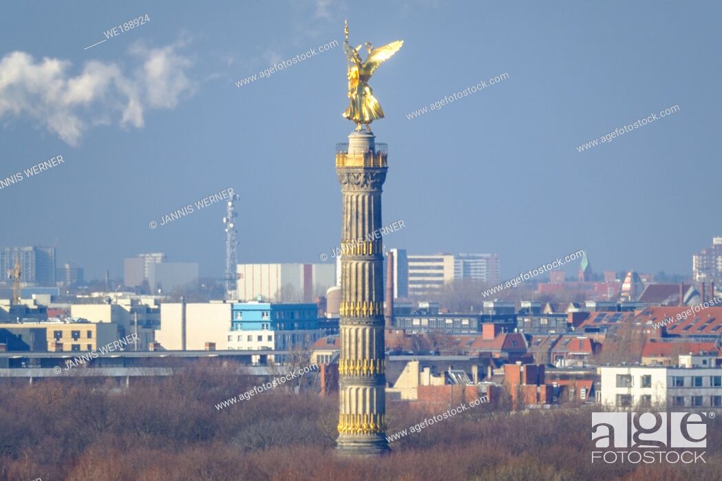 Stock Photo: View of the Siegessäule (victory column) above the Tiergarten park in central Berlin in winter.