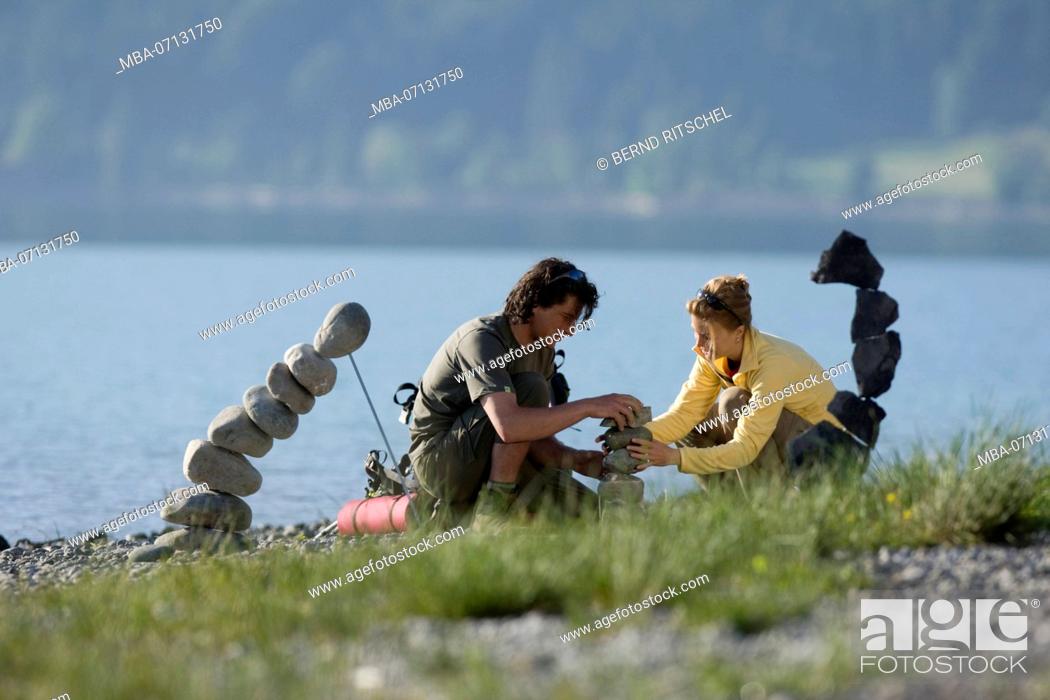 Stock Photo: Couple on the Zwergern peninsula at Walchensee (Lake Walchen), Bavarian Alps, Bavaria, Germany.