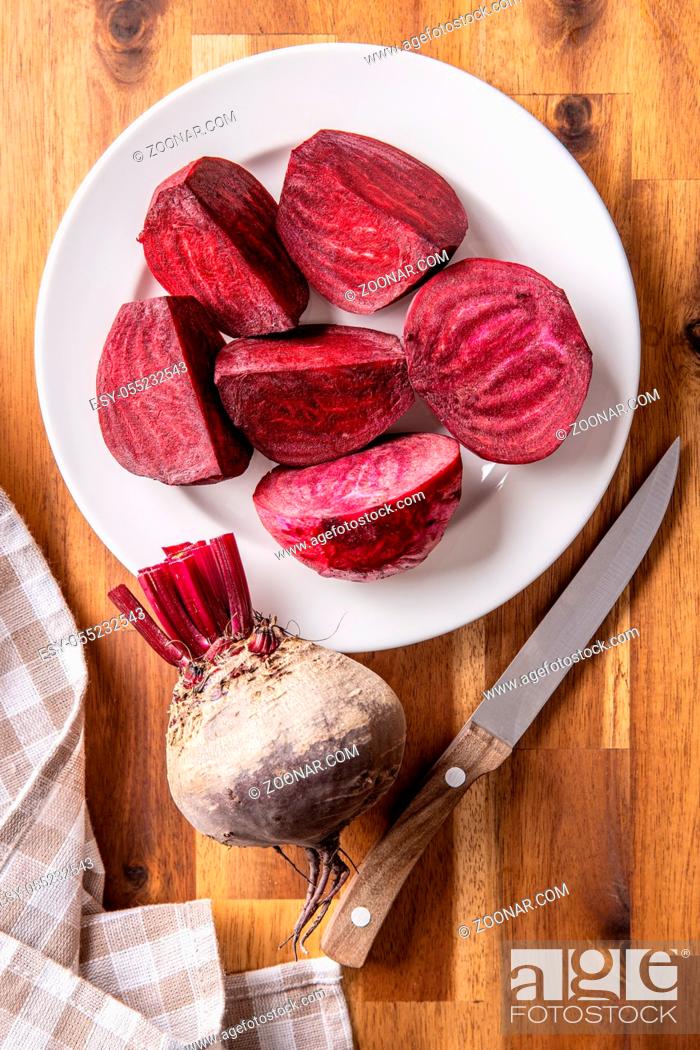 Stock Photo: Tasty raw beetroot. Sliced beetroot on plate. Top view.