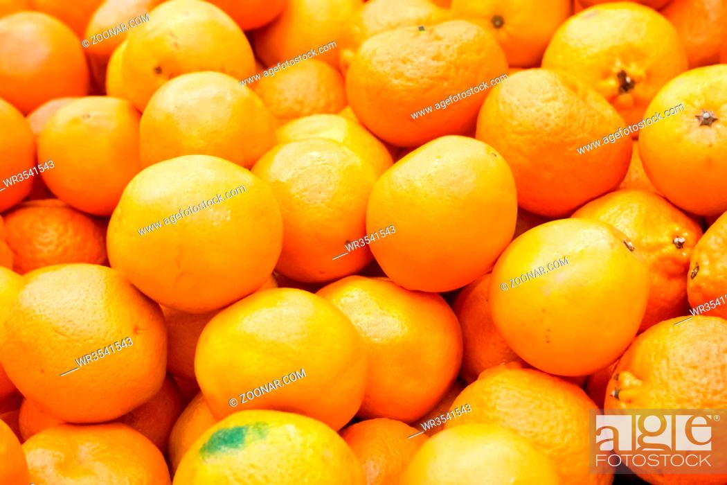 Stock Photo: Pile of fresh oranges and mandarins at market.