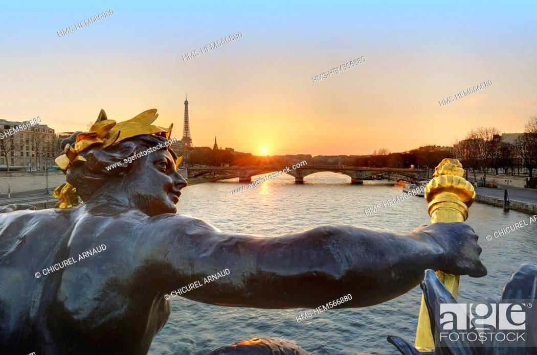 Stock Photo: France, Paris, the banks of the Seine river listed as World Heritage by UNESCO with the statue of the nymph of Neva on Alexander III bridge.