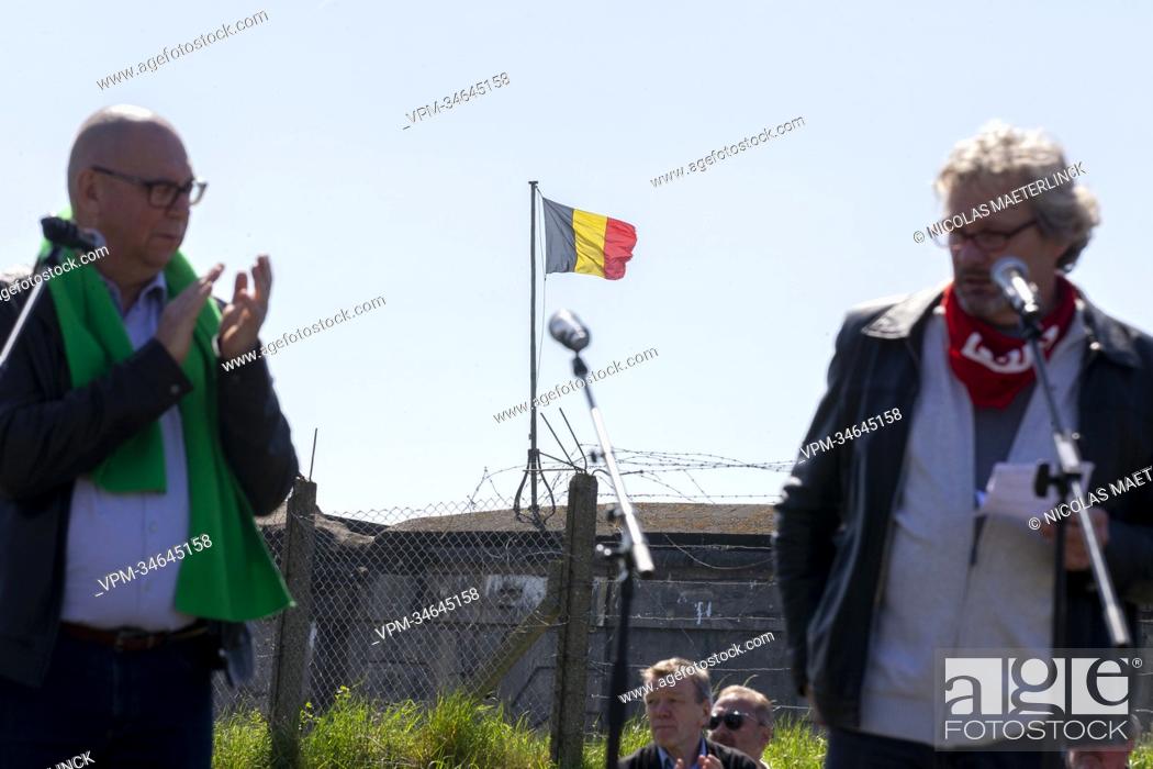 Stock Photo: Illustration picture shows the Belgian flag as ACV/CSC christian union chairman Marc Leemans and FGTB General secretary Thierry Bodson deliver a speech during a.