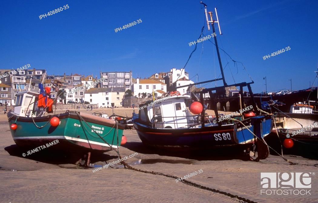 Stock Photo: Fishing harbour beach at low tide in the seaside resort of St Ives.