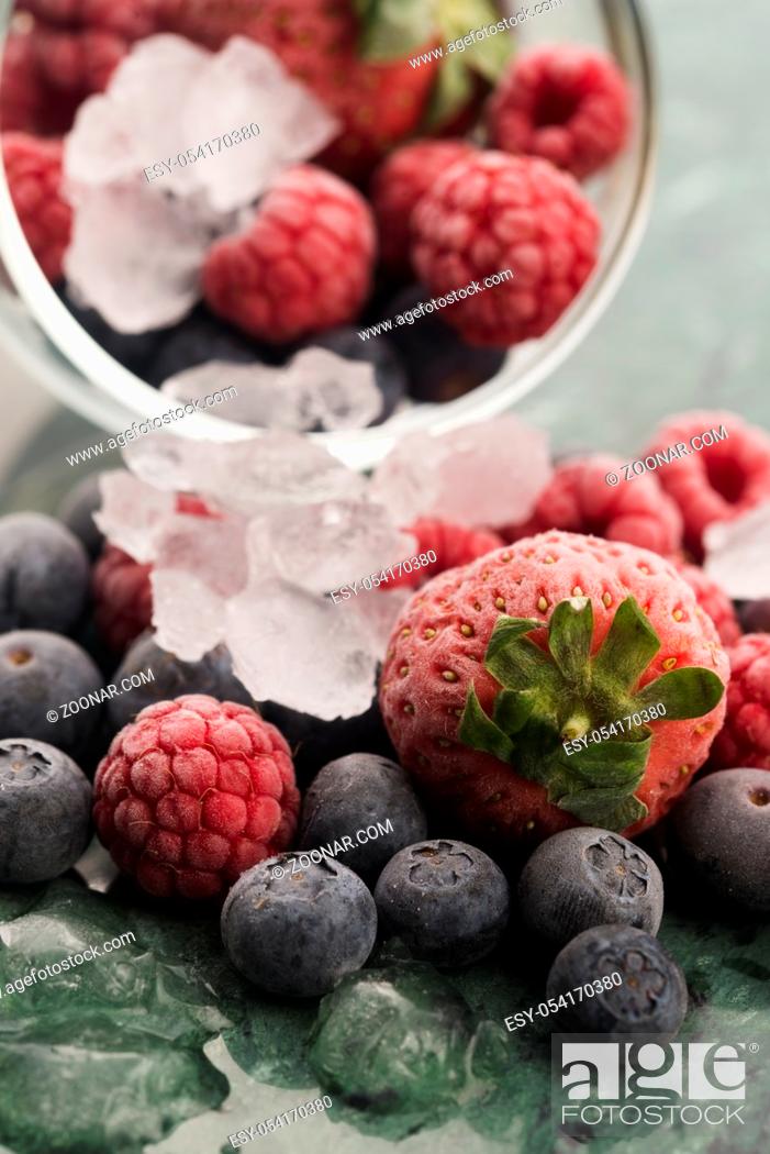 Stock Photo: Closeup shot of frozen raspberries, blackberries and strawberries.