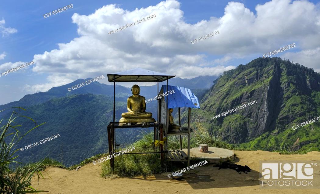 Stock Photo: Buddha statue in the Little Adamâ. . s Peak in Ella, Sri Lanka.