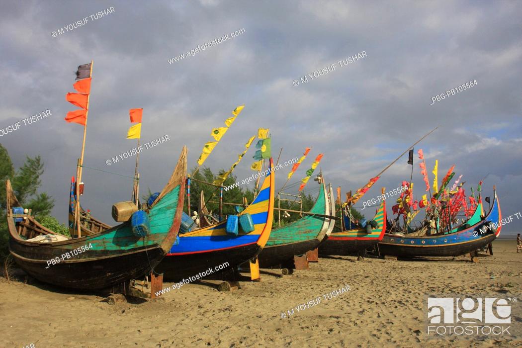 Stock Photo: Colourful fishing boats at Teknaf Cox’s Bazar, Bangladesh September 2008.