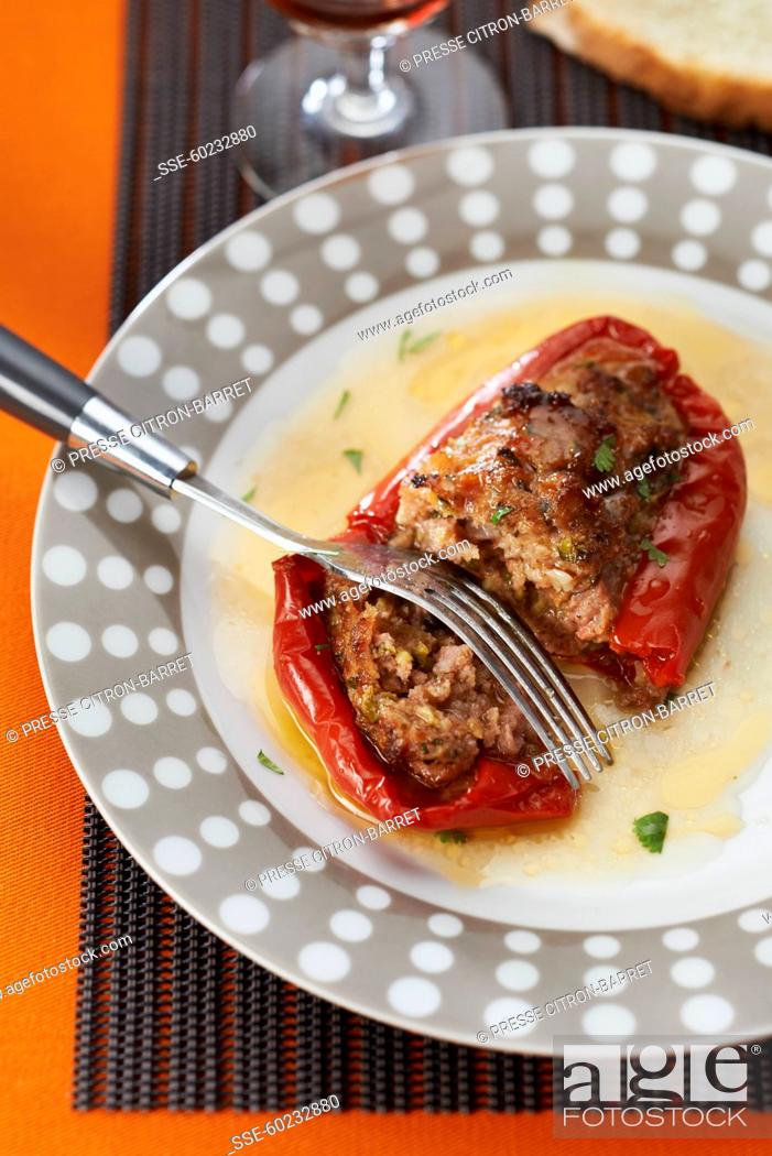 Stock Photo: Red pepper stuffed with sausage meat.
