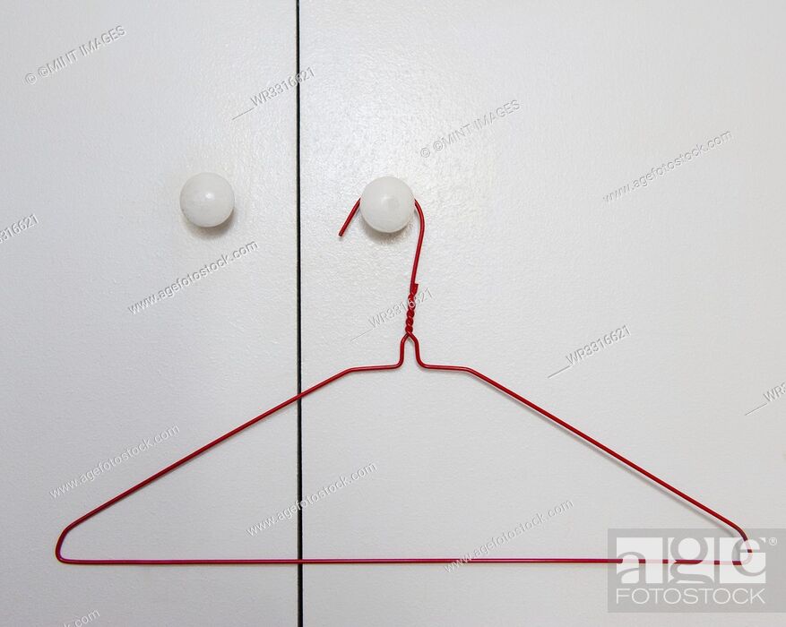 Stock Photo: Red Wire Hanger.