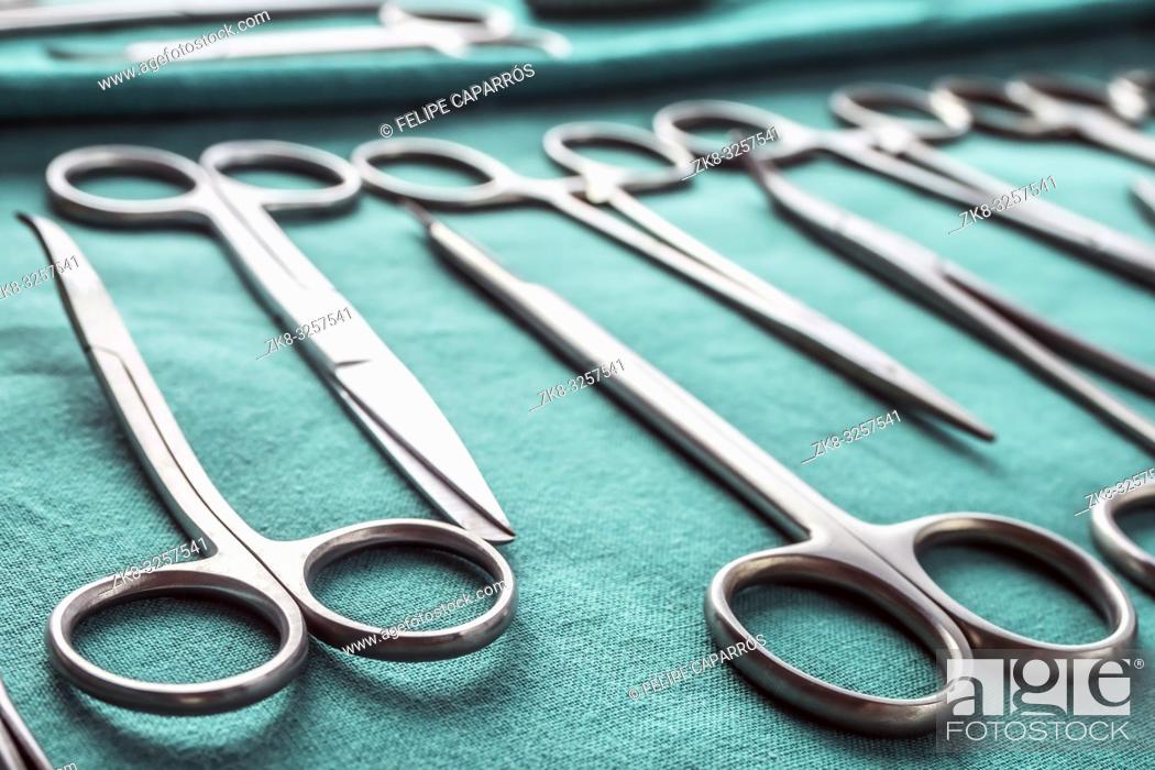 Stock Photo: Some scissors for surgery in an operating theater, conceptual image, horizontal composition.