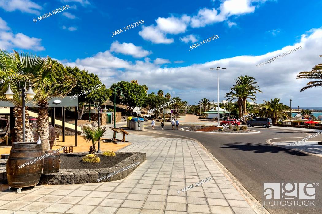 Stock Photo: street with shops and restaurants, costa teguise, lanzarote, canaries, canary islands, spain.