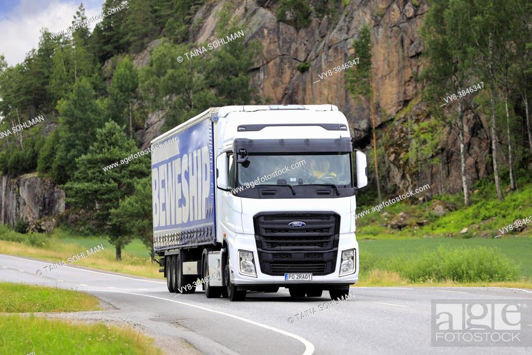 Stock Photo: Ford F-MAX, heavy truck by Ford Otosan, International Truck of the Year 2019, PL plates, pulls semi trailer on Road 52, Salo, Finland. July 9, 2021.