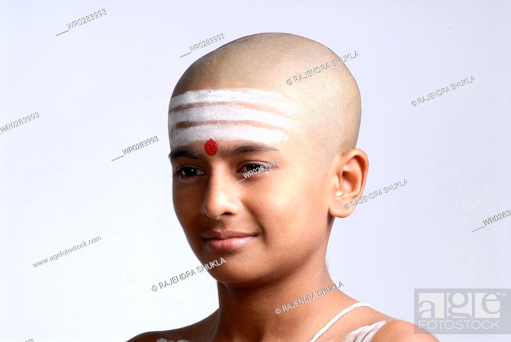 Portrait of South Asian Indian bald boy red tilak on forehead MR719, Stock  Photo, Picture And Royalty Free Image. Pic. WR0283993 | agefotostock