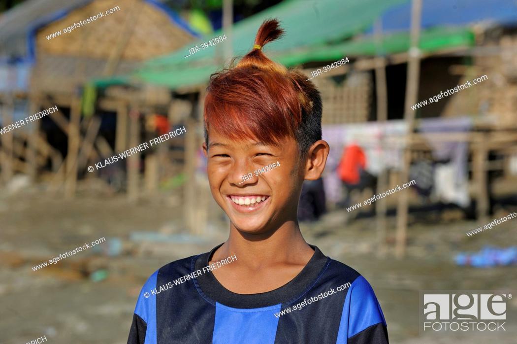 Stock Photo: Boy from the slums with dyed hair and fashionable hairstyle, Irrawaddy, Mandalay, Mandalay District, Myanmar.