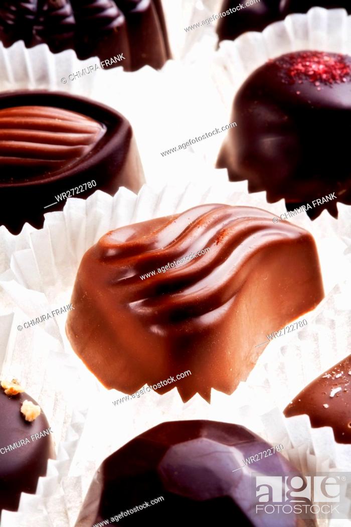 Stock Photo: assortment of delicious dark chocolate belgian pralines.