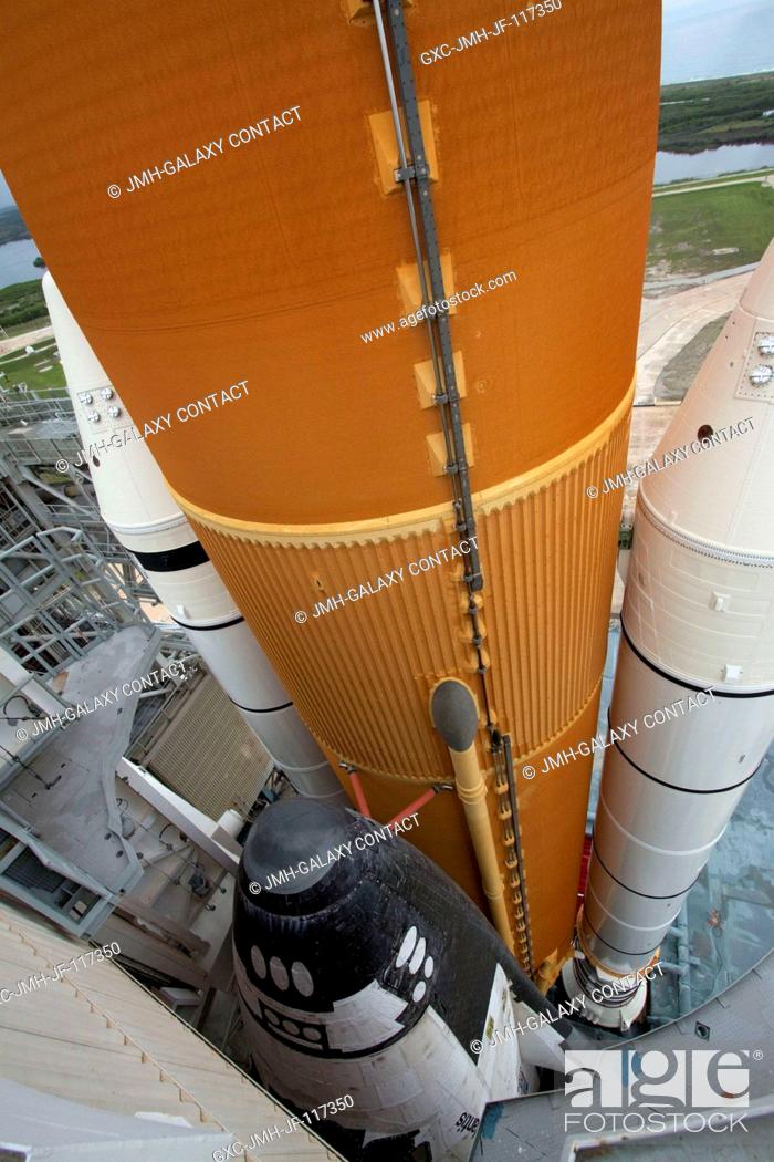 Stock Photo: Space shuttle Atlantis is revealed on Launch Pad 39A at NASA's Kennedy Space Center in Florida following the move of the rotating service structure (RSS).