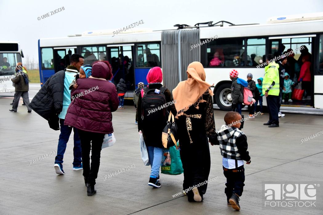 Stock Photo: Refugees from Eritrea and Ethiopia arrive at Kassel Airport in Calden, Germany, 14 December 2015. A group 156 so-called resettlement refugees from Khartoum.